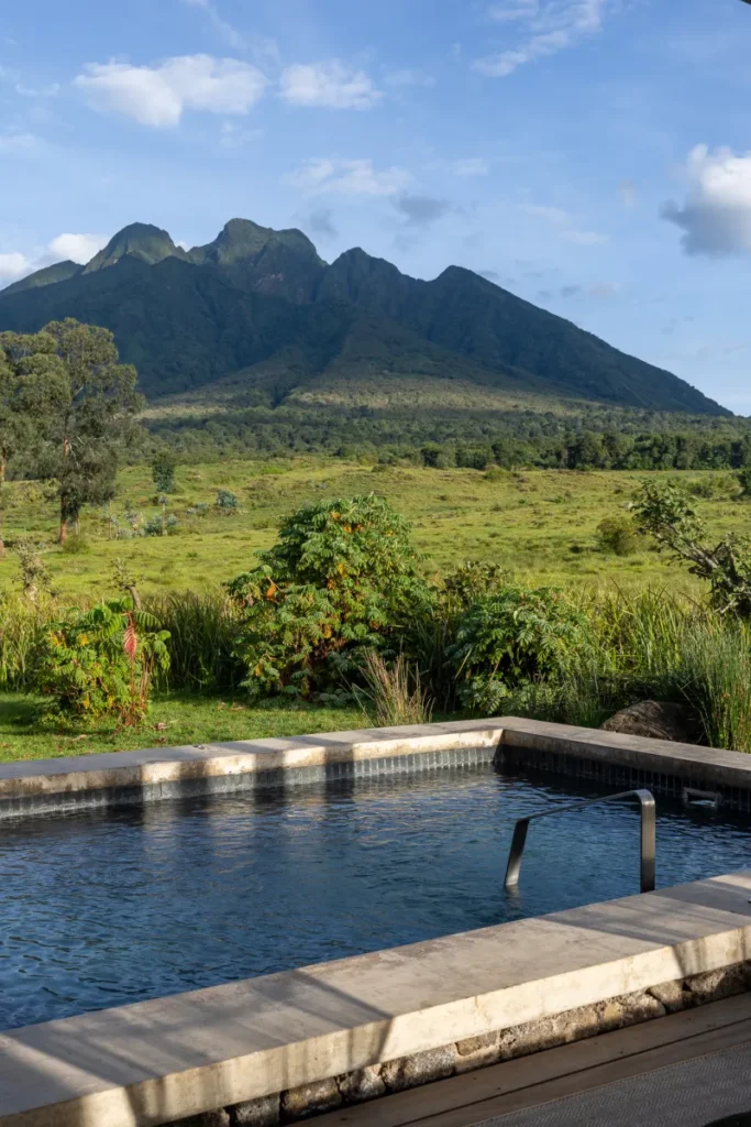 The Best Luxury Lodges With Volcano Views in Rwanda offer one of the most memorable accommodation experiences in East Africa, combining sophisticated hospitality with the dramatic scenery of the Virunga Mountains.