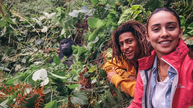 Teenagers enjoying gorilla trekking experience in Rwanda
