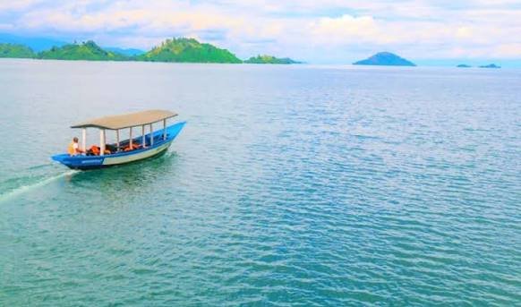 Mountain Gorilla Trekking in Volcanoes National Park Lake Kivu Boat Cruise Scenic Rwanda Countryside Drive Kigali City Experience Luxury Lakeside Relaxation