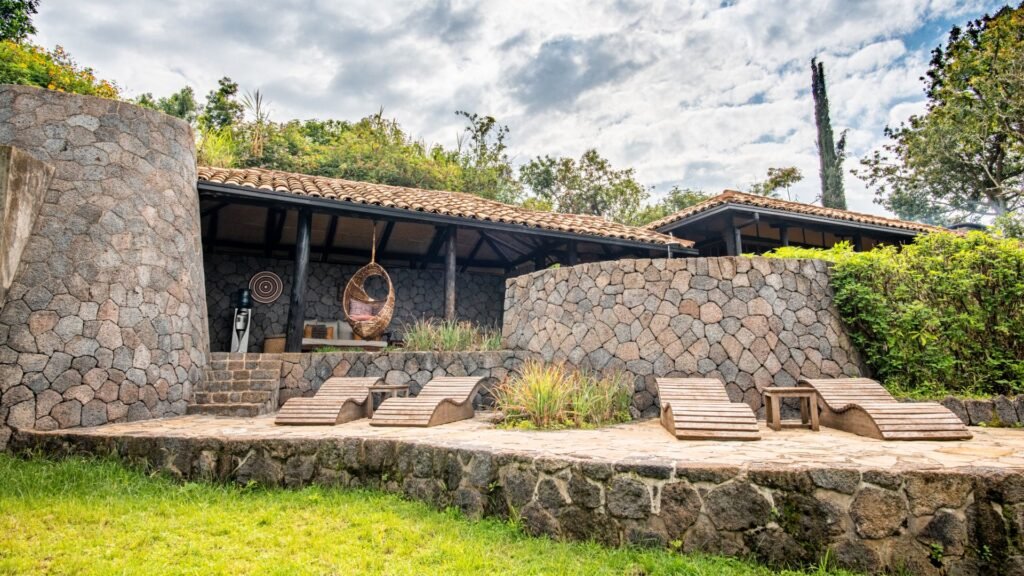 Virunga Lodge Rwanda is one of the country's most established luxury gorilla lodges, dramatically positioned on a ridge overlooking the Virunga Volcanoes and the twin lakes of Burera and Ruhondo.
